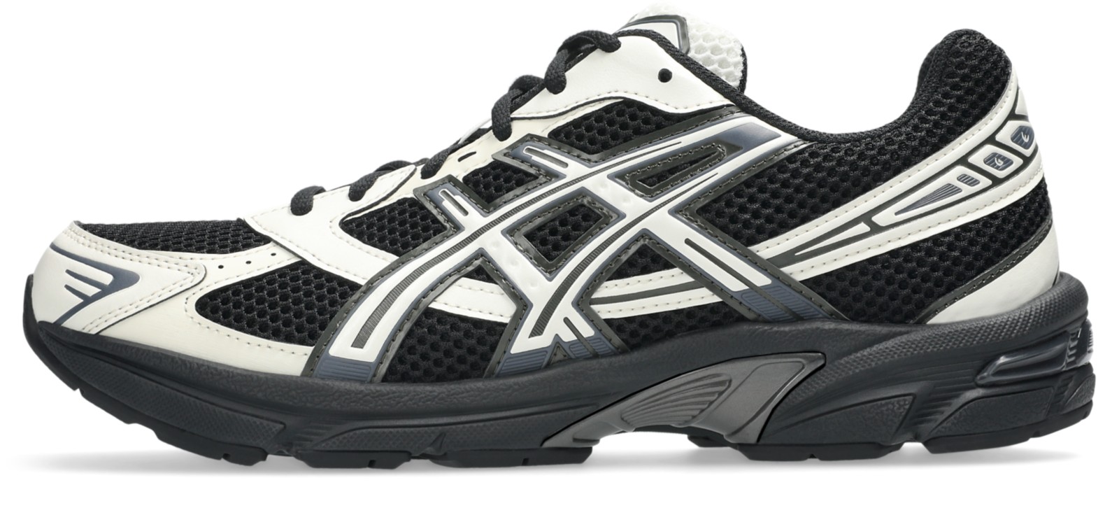 片足の側面：黒いメッシュとクリーム色の補強。写真：ASICS公式1203A609-001商品ページ