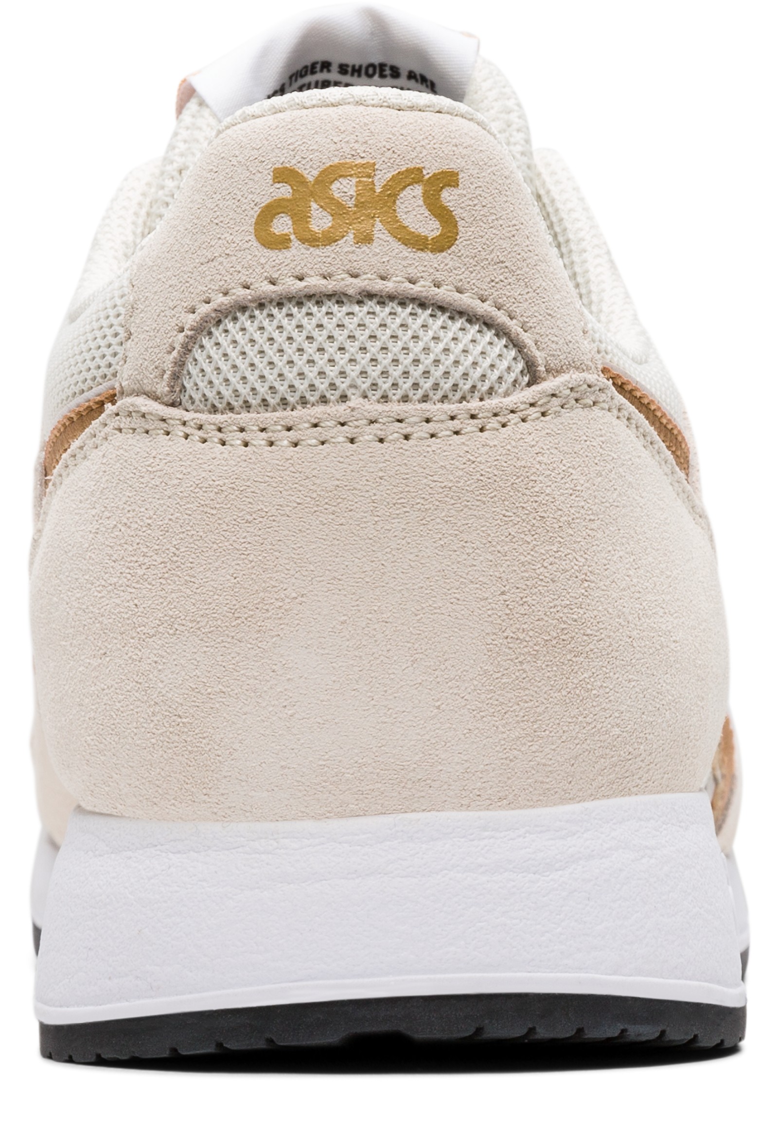 踵のアップ：ゴールドのロゴと織り目の窓。写真：ASICS公式1192A181-200商品ページ